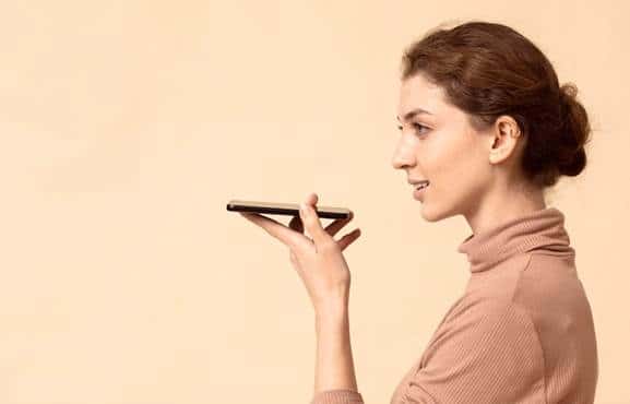 User performing a voice search using a smartphone voice assistant